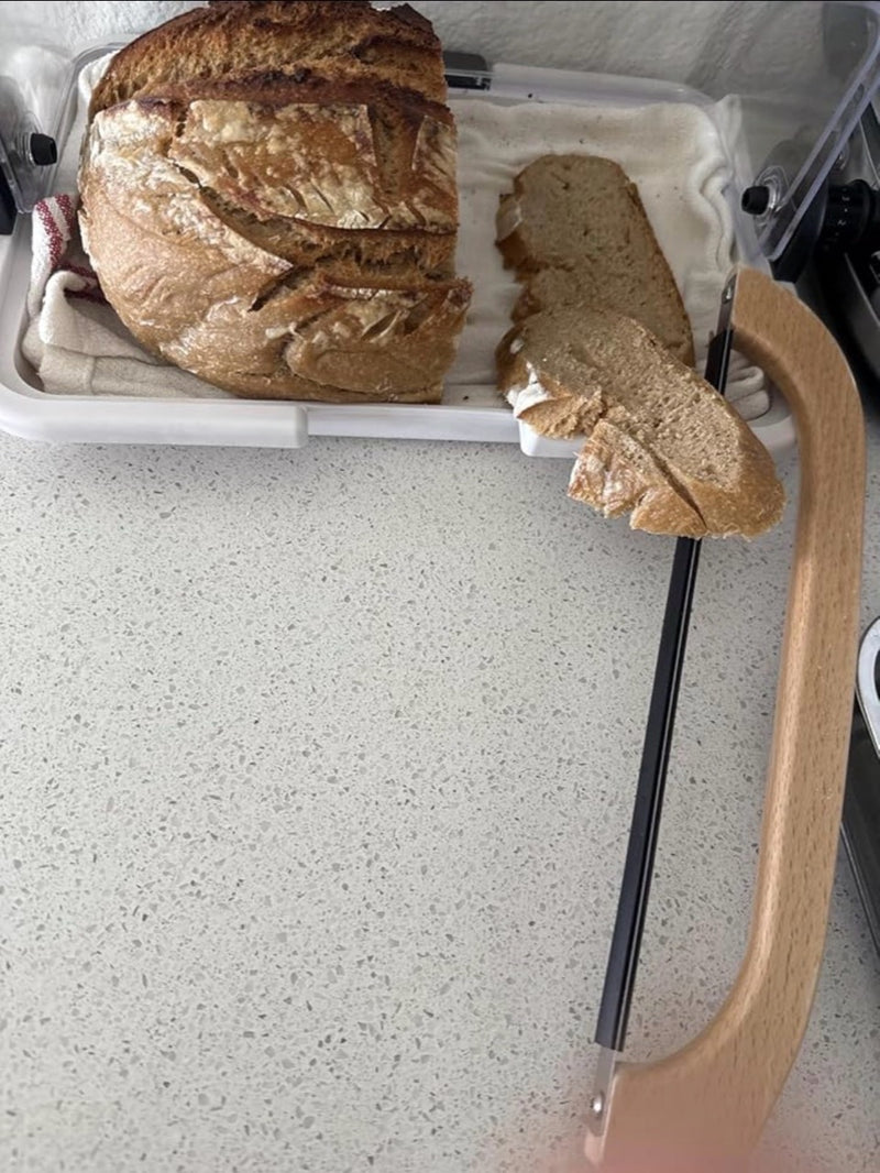 Vaishali T. review photo showing sliced sourdough and a bread knife